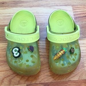 Green Crocs with 4 Jibbitz, Kids Size 10 / 11